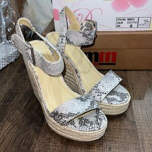 Snakeskin wedges. Never worn